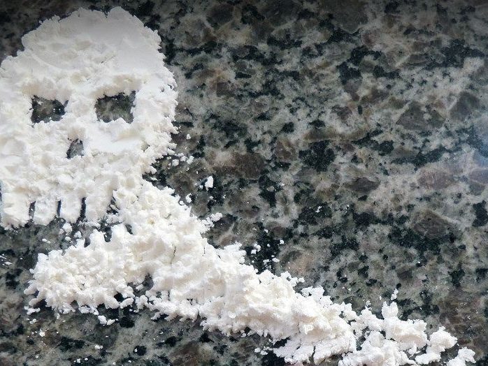 cocaine on table in the shape of the skull