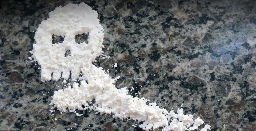 cocaine on table in the shape of the skull