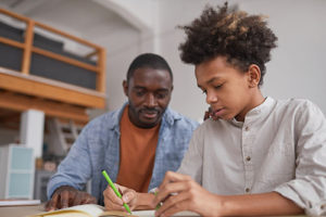 teen and dad learning about autism in mental health