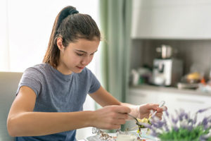 teen girl eating and wondering about disordered eating in teens