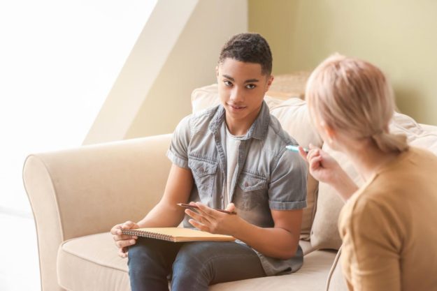 Teen and therapist discuss benefits of counseling for teens