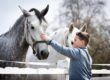 boy with horse learning about the best experiential therapies