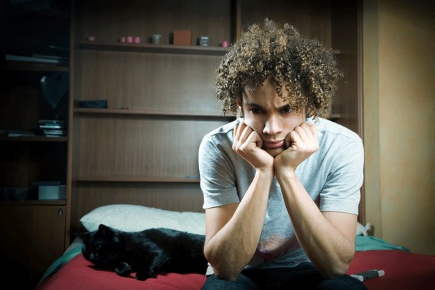 teenager with curly hair experiencing untreated anxiety