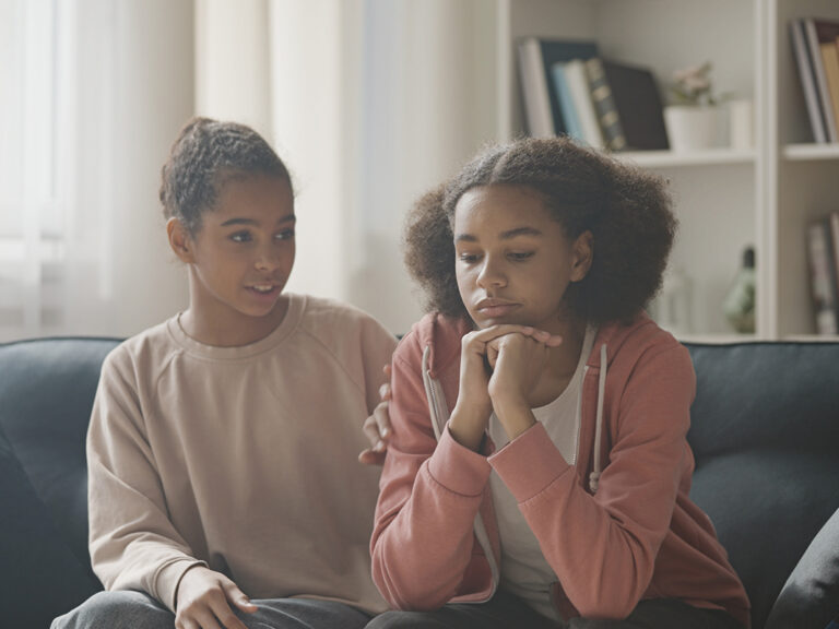 two teens learn about types of neurodivergence