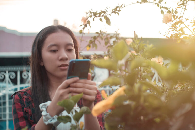 teen girl outside thinking about the symptoms of ocd in teens