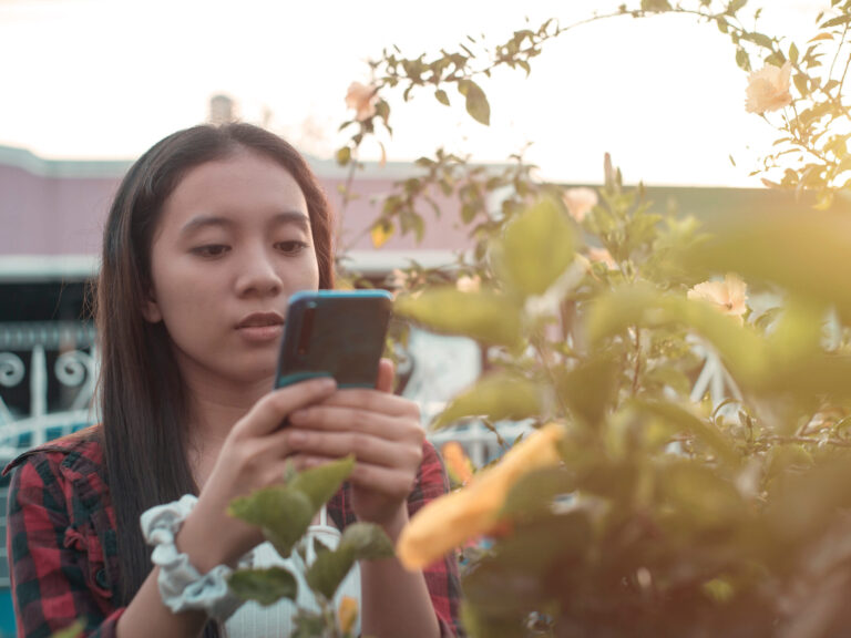 teen girl outside thinking about the symptoms of ocd in teens