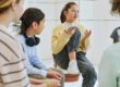 teen in yellow sweater talks with group about the origin of BIPOC mental health month