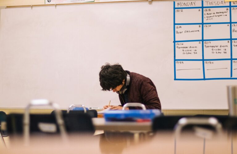 teen studying in school classroom