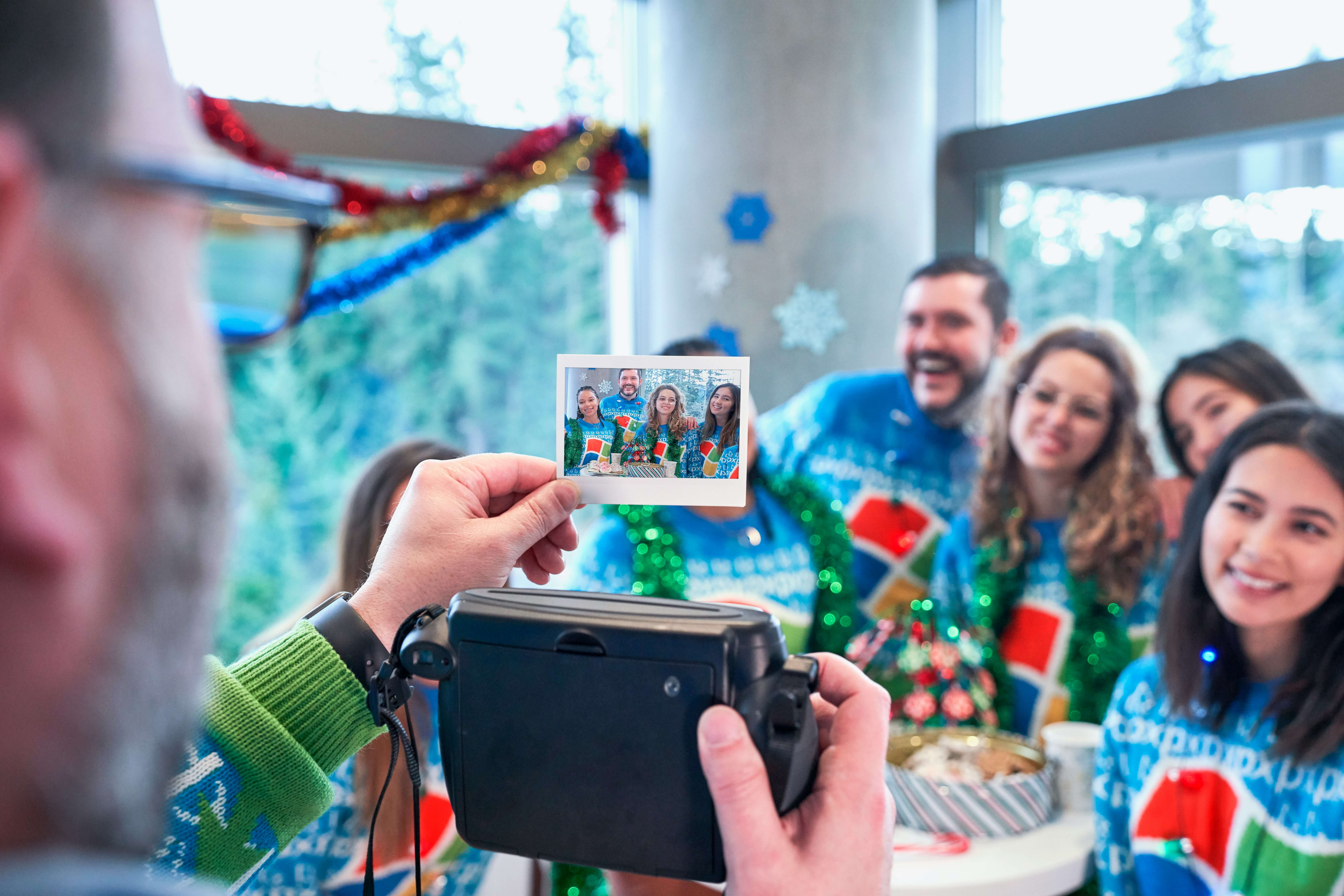 family posing for holiday photos